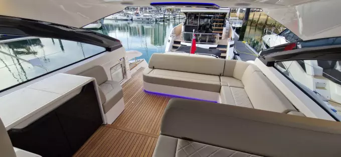 2025 Fairline Targa 45 Open yacht interior with luxurious seating and modern design.