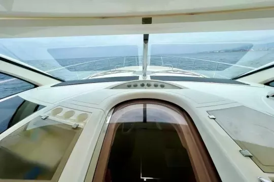 2006 Fairline Targa 52 GT yacht interior with ocean view through panoramic windows.