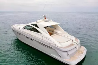 2006 Fairline Targa 52 GT luxury yacht on calm ocean waters.