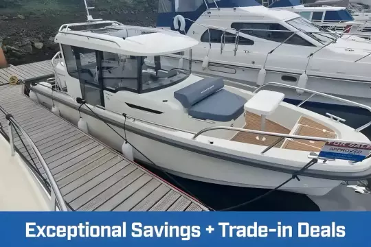 2023 Nimbus Commuter 8 boat docked, available for sale with trade-in deals.