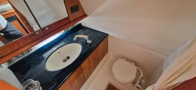 2003 Sunseeker Superhawk 34 bathroom with sink and toilet.