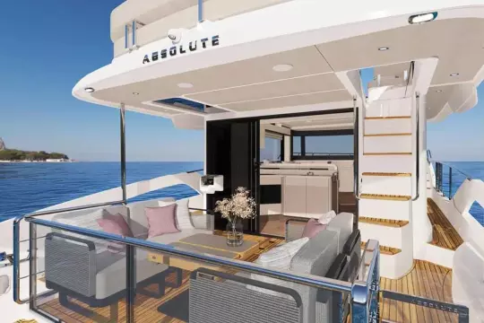 Luxury yacht Absolute NAVETTA 50, 2026, with stylish outdoor deck and sea view.