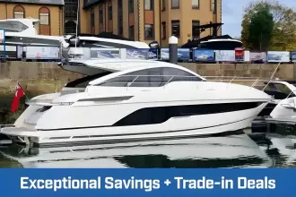 2024 Fairline Targa 45 Open yacht docked, showcasing sleek design with trade-in deals promotion.