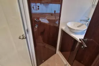 Luxurious bathroom interior of 2024 Fairline Targa 45 Open yacht with modern fixtures.