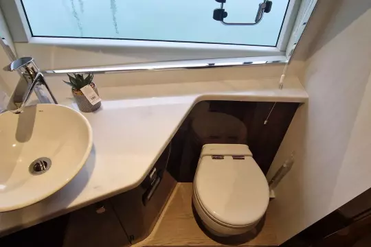 Luxurious bathroom in 2024 Fairline Targa 45 Open yacht with modern fixtures.