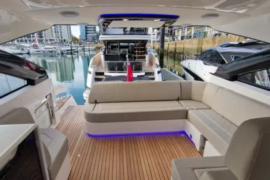 2024 Fairline Targa 45 Open yacht interior with luxurious seating and modern design.