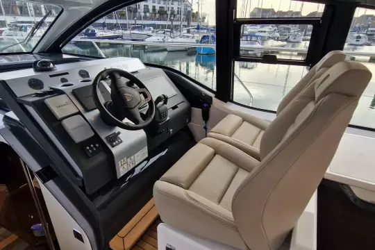 Interior cockpit of 2024 Fairline Targa 45 Open yacht with modern controls and seating.