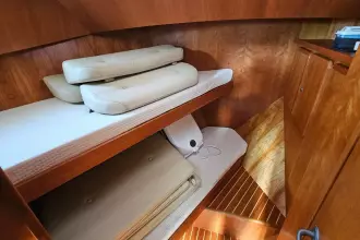 2008 Linssen Grand Sturdy 380 AC cabin interior with wooden finish and cushioned seating.