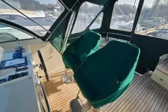 2008 Linssen Grand Sturdy 380 AC yacht interior with covered seats and steering wheel.