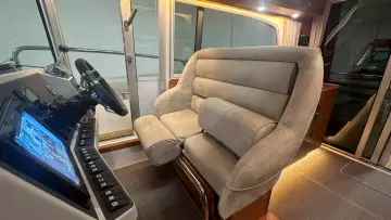 Luxurious interior of 2008 Nimbus 42 Nova boat with plush seating and modern controls.