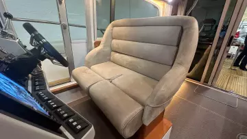 Luxurious interior seating of 2008 Nimbus 42 Nova boat, featuring plush upholstery and modern controls.