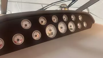 Dashboard of a 2008 Nimbus 42 Nova boat with multiple gauges and controls.