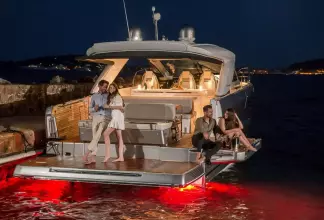 Jeanneau DB 43 inboard - socialising at night on the terraces with under water lights